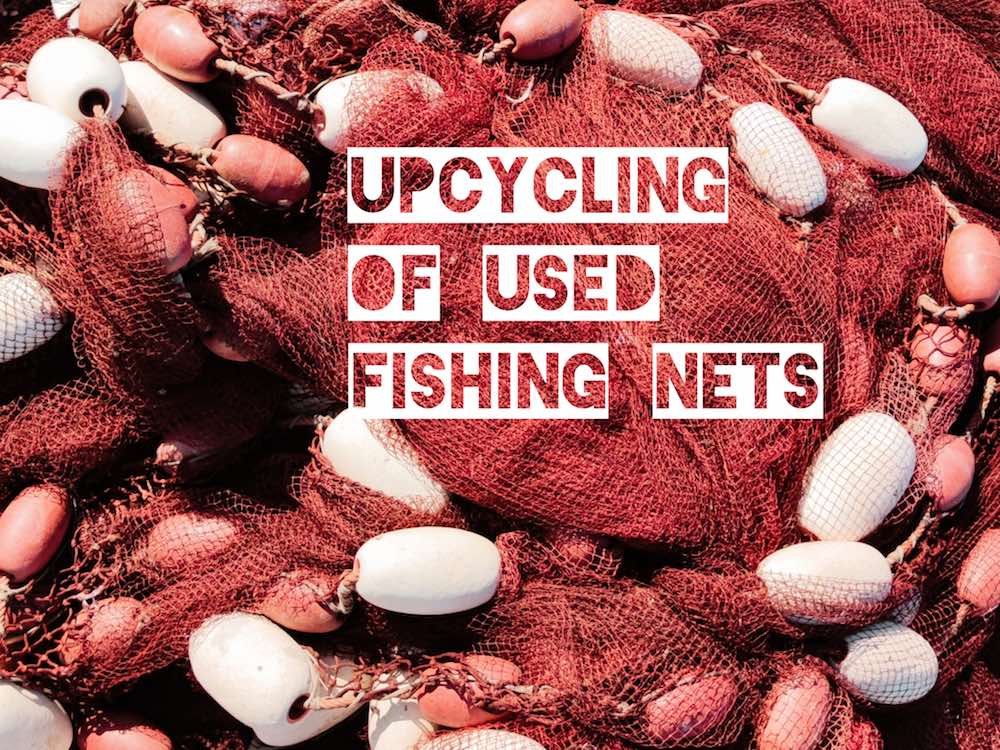 Red Moroccan fishing nets. A white text says: Upcycling of used fishing nets.