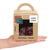 A box on a hand with a Fischnetz sponge alternative inside. The box is presented as a sustainable and eco-friendly corporate gift idea. The Fischnetz with Benefits logo is in one corner. The logo in the other corner says "your logo".