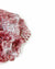 Red Fischnetz With Benefits as a reusable kitchen sponge alternative. The net is wet and has foam on it.